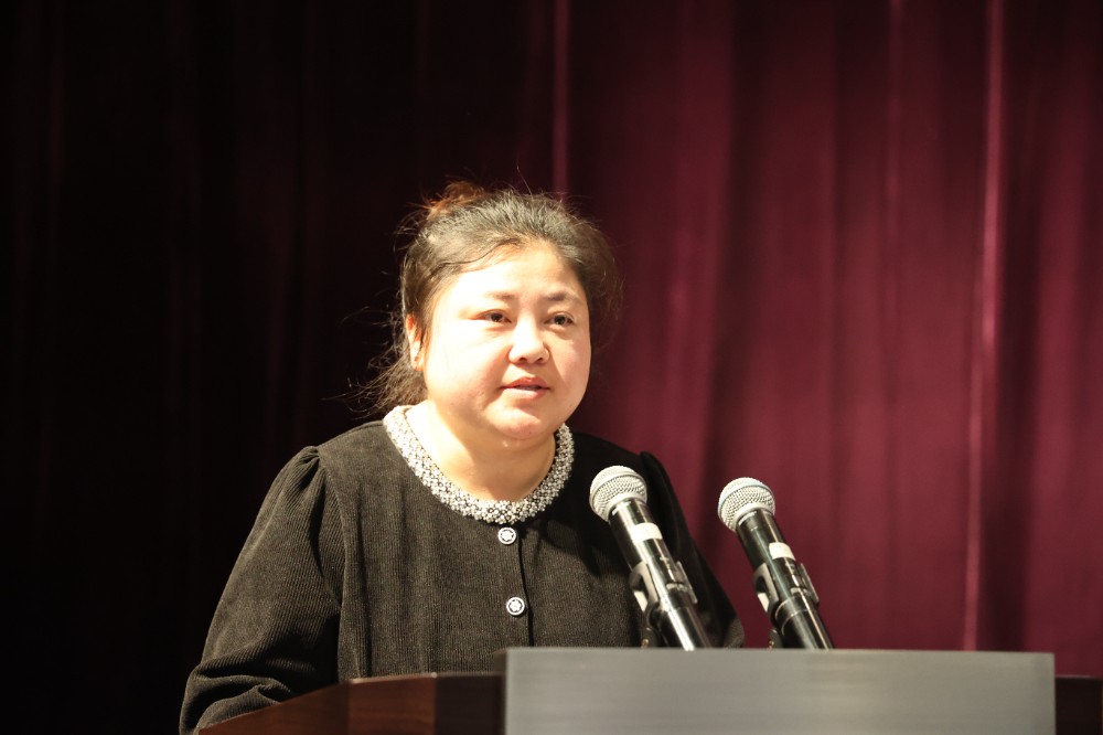 11.志愿者工作部一级助理田媛媛宣读决定.JPG